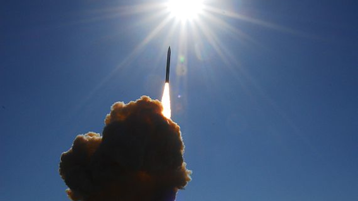 Would global nuclear disarmament increase the likelihood of global military conflict?