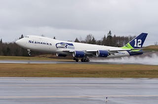 Boeing Seattle Seahawks 747-8 flies 12 pattern over Washington 
