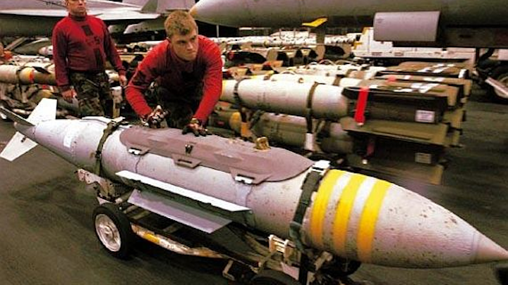 Navy F/A-18 combat jets being fitted for laser-guided JDAM smart bombs to attack moving targets