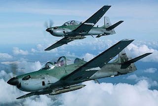Embraer sells eight Super Tucano turboprops at Farnborough Tuesday, bringing its show total to 15