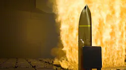 This image represents the new LRASM anti-ship missile firing from a surface warship's vertical launch system.