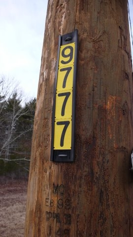 National Grid uses these tags to mark their Distribution poles