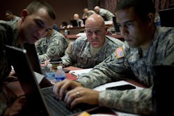U.S. Army cyber security experts work on an exercise at the Army Cyber Center of Excellence at Fort Gordon Ga.