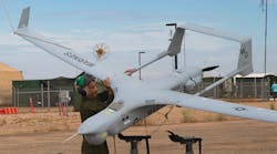 U.S. Marine Corps Lance Cpl. Isaiah Trujillo, an unmanned aircraft system maintenance technician, recovers a U.S. Marine Corps RQ-21A Blackjack unmanned aircraft at Canon Air Defense Complex in Yuma, Ariz.