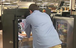 Technician at a Northrop Grumman facility in Charlottesville, Virginia, inspect a 3D printed manifold for one of their navigation systems. Technician at a Northrop Grumman facility in Charlottesville, Virginia, inspect a 3D printed manifold for one of their navigation systems.