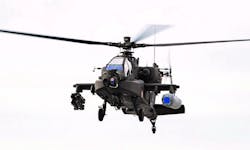 A high-energy laser system is shown above mounted on a U.S. Army Boeing AH-64 Apache attack helicopter during flight tests at White Sands Missile Range, N.M.