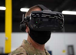 Chief Master Sgt. Courtney Freeman, 1st Special Operations Wing command chief, uses a virtual reality headset during the FieldWerx military open event in Fort Walton Beach, Fla., Aug. 24, 2020. VR is used across the force to provide training to Airmen on how to maintain aircraft, fly remotely piloted aircraft, or perform other technical tasks in a safe environment. Chief Master Sgt. Courtney Freeman, 1st Special Operations Wing command chief, uses a virtual reality headset during the FieldWerx military open event in Fort Walton Beach, Fla., Aug. 24, 2020. VR is used across the force to provide training to Airmen on how to maintain aircraft, fly remotely piloted aircraft, or perform other technical tasks in a safe environment.