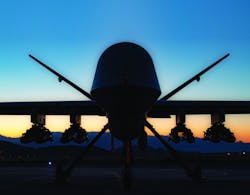 An MQ-9A Reaper sits on the ramp at Creech Air Force Base, Nev., in the first flight test of the MQ-9 carrying eight Hellfire missiles. An MQ-9A Reaper sits on the ramp at Creech Air Force Base, Nev., in the first flight test of the MQ-9 carrying eight Hellfire missiles.