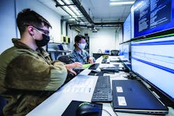 An Air Force cyber expert helps monitor malicious network activity during exercise Tacet Venari at Ramstein Air Base, Germany.