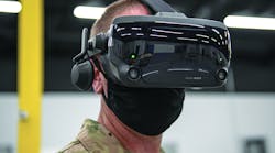 A U.S. Air Force chief master sergeant uses a virtual reality headset, which can provide training on how to maintain aircraft, fly remotely piloted aircraft, or perform other technical tasks in a safe environment.
