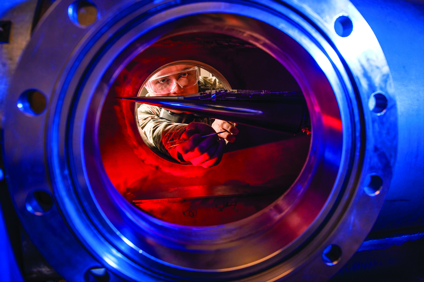 An Air Force Cadet uses a Ludwieg tube, a type of wind tunnel, to measure the pressures, temperatures, and flow fields of basic geometric and hypersonic research vehicles.