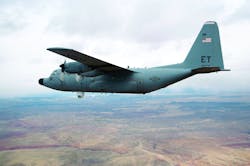 A specially modified NC-130H aircraft equipped with the Advanced Tactical Laser weapon system fired its laser while flying over White Sands Missile Range, N.M., successfully hitting a target board located on the ground.