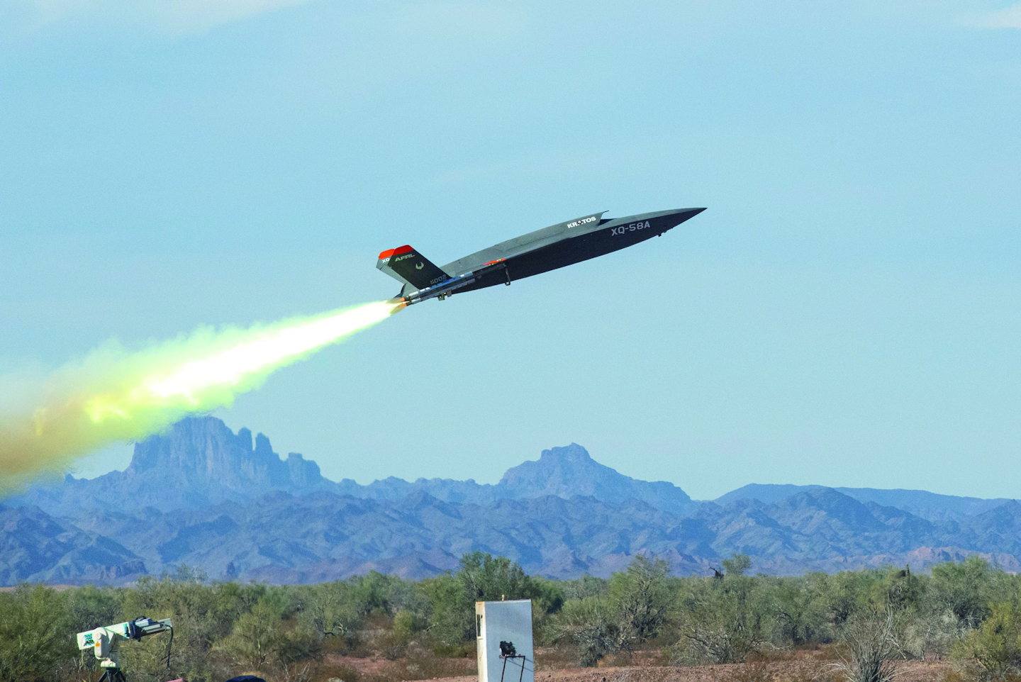 An XQ-58A Valkyrie low-cost unmanned aerial vehicle launches at the U.S. Army Yuma Proving Ground, Ariz., to demonstrate new communications ability to exchange information with other aircraft.