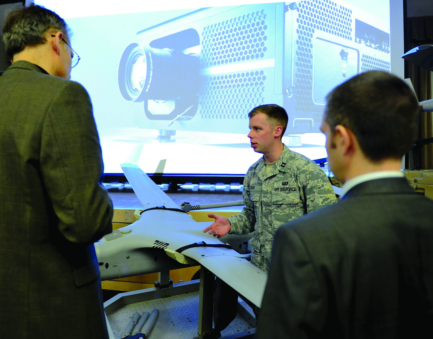 Capt. Lee M. Todd, an engineer at the Air Force Research Laboratory, briefs media during the release of the Small Unmanned Aircraft System Flight Plan at the Pentagon Conference Center.