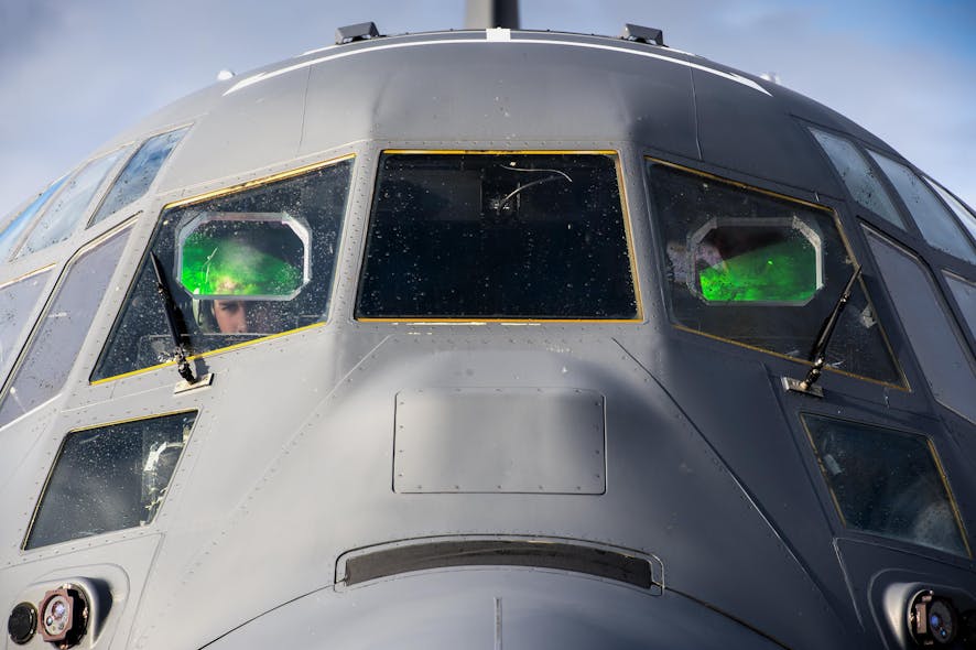 An Air Force loadmaster performs preflight checks in the cockpit of an HC-130J aircraft. Multi-core processors in cockpit avionics are difficult to certify because they were not designed with that task in mind.