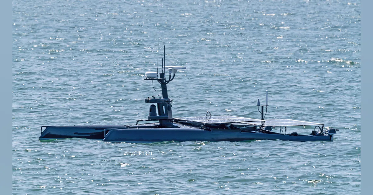 Uav Using Asw unmanned surface vessel (USV) anti-submarine warfare (ASW) sonar ...