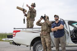 Army soldiers discuss where they saw a drone during an unmanned aerial system training exercise in the Kurdistan Region of Iraq.