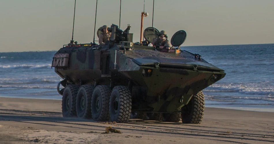 File:A crew member test fires the .50 cal machine gun off the ACV