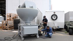 Naval Information Warfare Systems Center engineers check a fleet-bound OE570D UHF antenna onboard Naval Information Warfare Systems Command&apos;s Old Town San Diego campus.