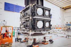 Boeing team members prepare the first two O3b mPOWER satellites for containerization ahead of delivery to satellite operator SES. Boeing team members prepare the first two O3b mPOWER satellites for containerization ahead of delivery to satellite operator SES.