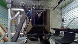 Rear view of the nozzle of the Braunscweig acoustic wind tunnel. The two microphone arrays are located below the Airbus wing and the Safran engine nozzle, and individual microphones are installed above the model. DLR/Airbus/Safran photo. Rear view of the nozzle of the Braunscweig acoustic wind tunnel. The two microphone arrays are located below the Airbus wing and the Safran engine nozzle, and individual microphones are installed above the model. DLR/Airbus/Safran photo.