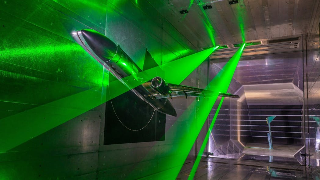 The NASA aircraft model inside the DNW Braunschweig Low-Speed Wind Tunnel (DNW-NWB) &apos;Sheets&apos; of laser light illuminating the inner and outer wings are used to measure flow velocities. Credit: DLR (CC BY-NC-ND 3.0)