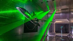 The NASA aircraft model inside the DNW Braunschweig Low-Speed Wind Tunnel (DNW-NWB) 'Sheets' of laser light illuminating the inner and outer wings are used to measure flow velocities. Credit: DLR (CC BY-NC-ND 3.0) The NASA aircraft model inside the DNW Braunschweig Low-Speed Wind Tunnel (DNW-NWB) 'Sheets' of laser light illuminating the inner and outer wings are used to measure flow velocities. Credit: DLR (CC BY-NC-ND 3.0)