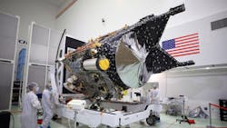 NASA’s Psyche spacecraft is shown in a clean room at the Astrotech Space Operations facility near the agency’s Kennedy Space Center in Florida on Dec. 8, 2022. DSOC’s gold-capped flight laser transceiver can be seen, near center, attached to the spacecraft. Credit: NASA/Ben Smegelsky. NASA’s Psyche spacecraft is shown in a clean room at the Astrotech Space Operations facility near the agency’s Kennedy Space Center in Florida on Dec. 8, 2022. DSOC’s gold-capped flight laser transceiver can be seen, near center, attached to the spacecraft. Credit: NASA/Ben Smegelsky.