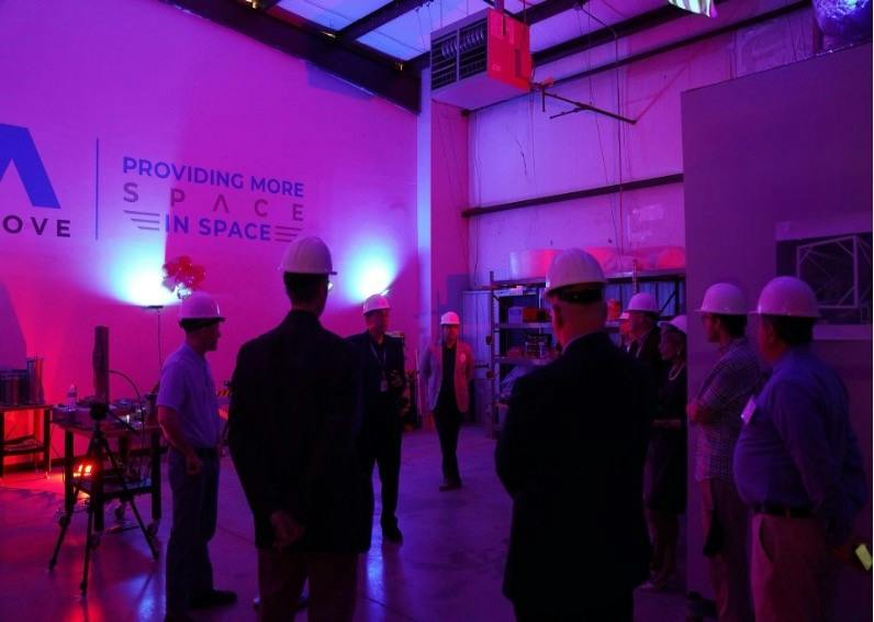 At a lab bench test, Electric Sky wirelessly powered a laser carried on the Above Archimedes which can be scaled to enable &lsquo;electrical substations&rsquo; in space. Above: Space CTO Tom Spilker explains the test to the group at the Above: Space facility in Huntsville, Alabama.
