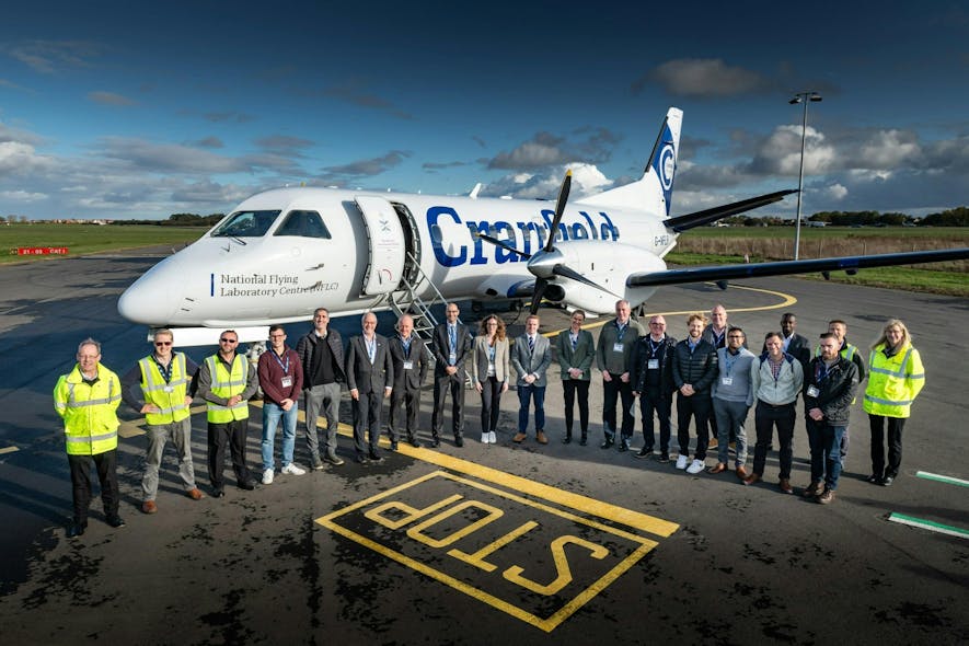 Representatives from the organizations involved in the UK sovereign Satellite Based Augmentation System (UK SBAS), next to the test aircraft.