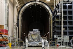 After completing final integration, Ball Aerospace technicians transport the Nancy Grace Roman Space Telescope's Wide Field Instrument (WFI) into Ball’s largest thermal vacuum chamber to begin environmental testing at a Ball facility in Boulder, Colorado. Ball photo. After completing final integration, Ball Aerospace technicians transport the Nancy Grace Roman Space Telescope's Wide Field Instrument (WFI) into Ball’s largest thermal vacuum chamber to begin environmental testing at a Ball facility in Boulder, Colorado. Ball photo.