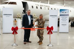 Ribbon cutting for the delivery of a modified Bombardier business jet for the U.S. Air Force Battlefield Airborne Communications Node (BACN) program based at Hanscom Air Force Base in Massachusetts in September 2023.
