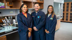A photo of a team of researchers from the University of Puerto Rico-Río Piedras while working to discover a more efficient water recycling system for use on space missions. The team is comprised of doctoral students Liz Santiago-Martoral, on the left, and Alondra Rodriguez-Rolon, and their mentor Professor Eduardo Nicolau. One of their experiments can be seen on the countertop to the left of the group. NASA photo.