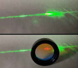 The heart of optically pumped quantum magnetometers: a diamond crystal enriched with color centers. Unlike many other quantum systems, diamond and SiC solid state quantum color centers operate at room temperature and can be readily accessed electrically or optically. The bottom photo, filtering the laser light for the observer, shows the red-shifted emission response of the quantum system. This response is encoded with quantum spin information, and can be used to read environmental influences, such as temperature, pressure, electric and, most importantly for us, magnetic field properties. Image credit A. Gottscholl/ NASA/JPL-Caltech. The heart of optically pumped quantum magnetometers: a diamond crystal enriched with color centers. Unlike many other quantum systems, diamond and SiC solid state quantum color centers operate at room temperature and can be readily accessed electrically or optically. The bottom photo, filtering the laser light for the observer, shows the red-shifted emission response of the quantum system. This response is encoded with quantum spin information, and can be used to read environmental influences, such as temperature, pressure, electric and, most importantly for us, magnetic field properties. Image credit A. Gottscholl/ NASA/JPL-Caltech.