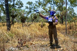 A U.S. Marine Corps technician uses artificial intelligence to fly an unmanned aircraft system during a squad attack range as a part of an exercise in Australia earlier this year. Marine Corps photo A U.S. Marine Corps technician uses artificial intelligence to fly an unmanned aircraft system during a squad attack range as a part of an exercise in Australia earlier this year. Marine Corps photo