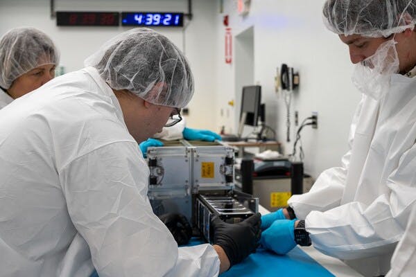 Technicians with the University of Kansas prepare their KUbeSat-1 for integration at Firefly&rsquo;s Payload Processing Facility at Vandenberg Space Force Base, California on Thursday, April 25, 2024. NASA photo.