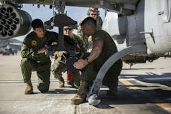 U.S. Marines with Marine Light Attack Helicopter Squadron 267 load a joint air-to-ground missile (JAGM) onto an AH-1Z Viper attack helicopter. U.S. Marines with Marine Light Attack Helicopter Squadron 267 load a joint air-to-ground missile (JAGM) onto an AH-1Z Viper attack helicopter.