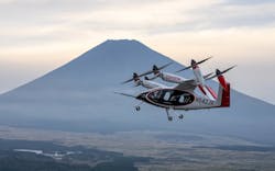 A Joby production prototype electric air taxi flying in front of Mount Fuji in Shizuoka, Japan. Photo by Joby Aviation. A Joby production prototype electric air taxi flying in front of Mount Fuji in Shizuoka, Japan. Photo by Joby Aviation.