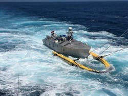 The Mine Countermeasure Unmanned Surface Vessel (MCM-USV) is recovered aboard the littoral combat ship USS Manchester (LCS 14) during a test in June 2021. The Mine Countermeasure Unmanned Surface Vessel (MCM-USV) is recovered aboard the littoral combat ship USS Manchester (LCS 14) during a test in June 2021.
