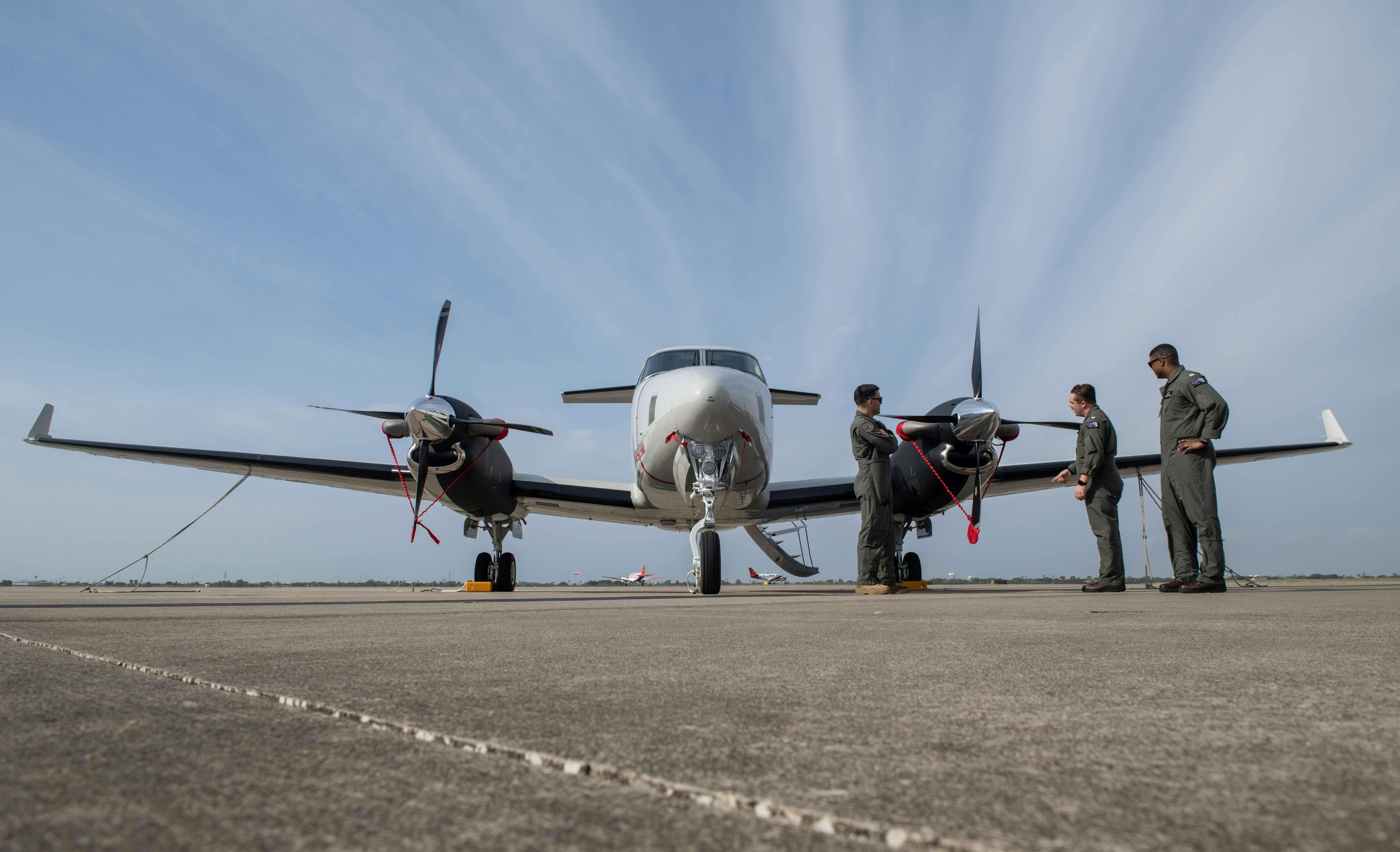 A T-54A multi-engine aircraft sits on the flight line of Corpus Christi Naval Air Station, Texas, last April.