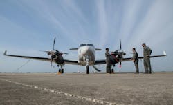 A T-54A multi-engine aircraft sits on the flight line of Corpus Christi Naval Air Station, Texas, last April. A T-54A multi-engine aircraft sits on the flight line of Corpus Christi Naval Air Station, Texas, last April.