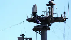 The AN/SPQ-9B X-band radar that scans the horizon for low-flying anti-ship cruise missiles, enemy ships, and aircraft.