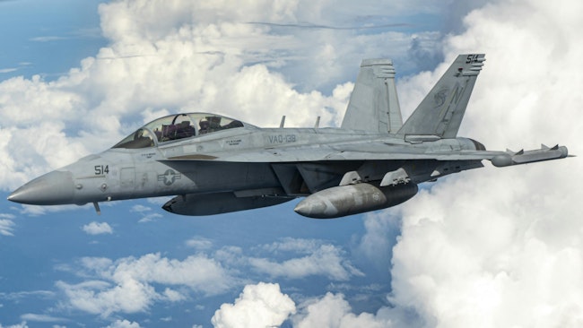 A Navy EA-18G Growler aircraft flies over the Pacific Ocean during Exercise Valiant Shield 22 in June 2022.