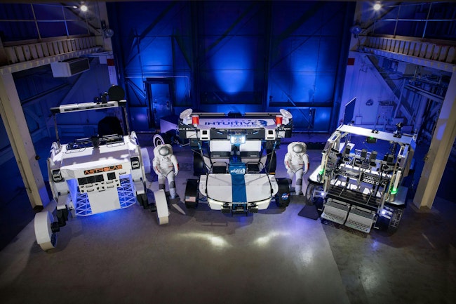 From left to right: Astrolab’s FLEX, Intuitive Machines’ Moon RACER, and Lunar Outpost’s Eagle lunar terrain vehicle at NASA’s Johnson Space Center. NASA/Bill Stafford photo.