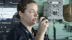 A Navy communications expert sends messages while aboard the amphibious assault ship USS Bataan (LHD 5) during an exercise in 2019.