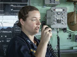A Navy communications expert sends messages while aboard the amphibious assault ship USS Bataan (LHD 5) during an exercise in 2019. A Navy communications expert sends messages while aboard the amphibious assault ship USS Bataan (LHD 5) during an exercise in 2019.