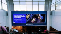 A United Airlines ad in an airport on a screen reading 'the inflight wi-fi revolution begins this spring.' A United Airlines ad in an airport on a screen reading 'the inflight wi-fi revolution begins this spring.'