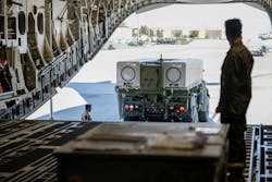 U.S. Marines back a Navy/Marine Corps Expeditionary Ship Interdiction System (NMESIS) launcher onto a C-17 cargo jet for transport at Travis Air Force Base, Calif. U.S. Marines back a Navy/Marine Corps Expeditionary Ship Interdiction System (NMESIS) launcher onto a C-17 cargo jet for transport at Travis Air Force Base, Calif.