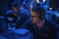 A Navy electronics technician stands watch in the combat information center aboard the Arleigh Burke-class guided-missile destroyer USS Sterett (DDG 104) in the South China Sea earlier this month. A Navy electronics technician stands watch in the combat information center aboard the Arleigh Burke-class guided-missile destroyer USS Sterett (DDG 104) in the South China Sea earlier this month.