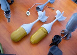 Prototype model of rocket bomb tip printed on 3D printer from molten plastic. Prototype model of rocket bomb tip printed on 3D printer from molten plastic.
